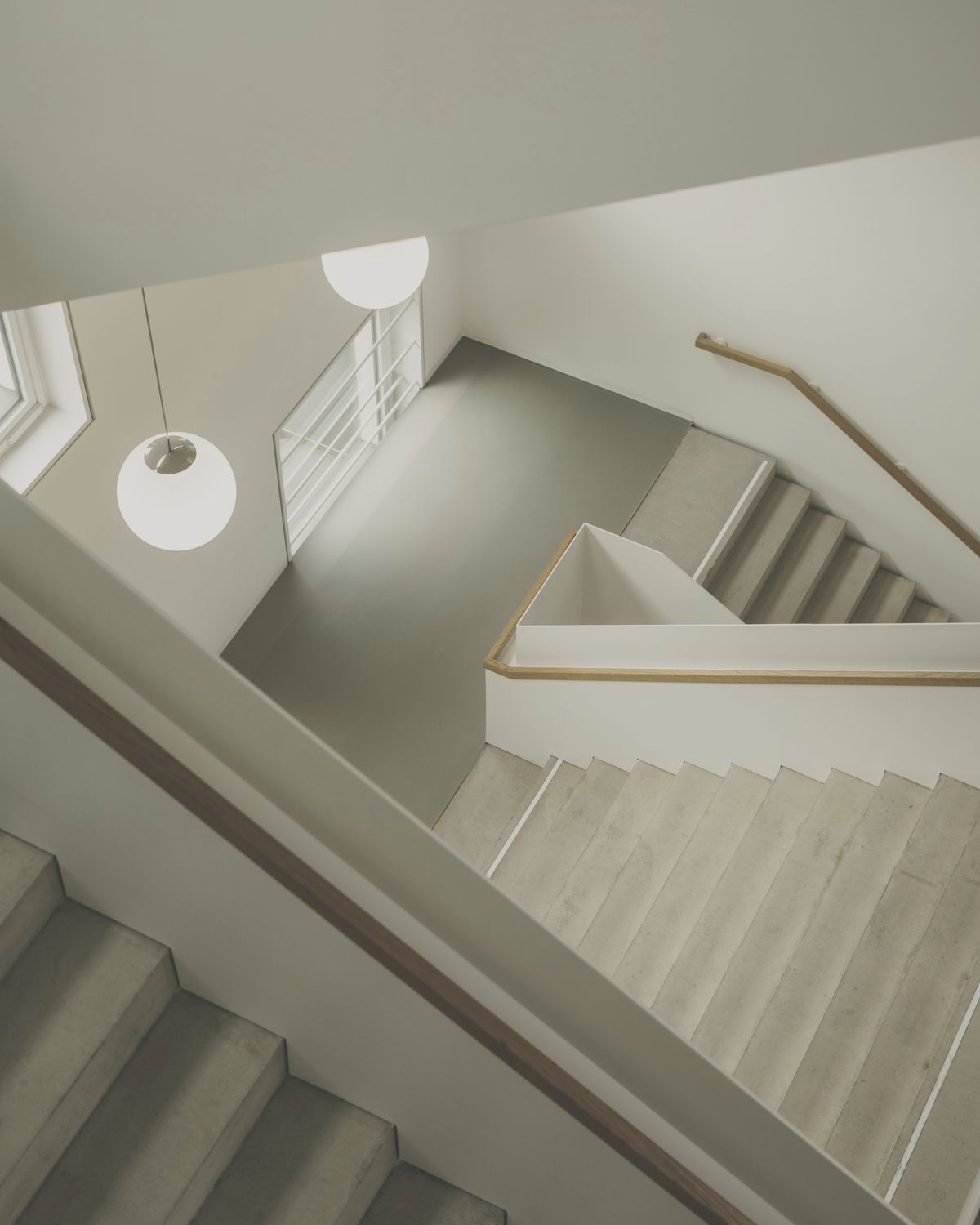 Soft-lit architectural stairwell